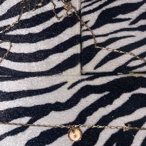 Gold chain necklace with light pink color stone